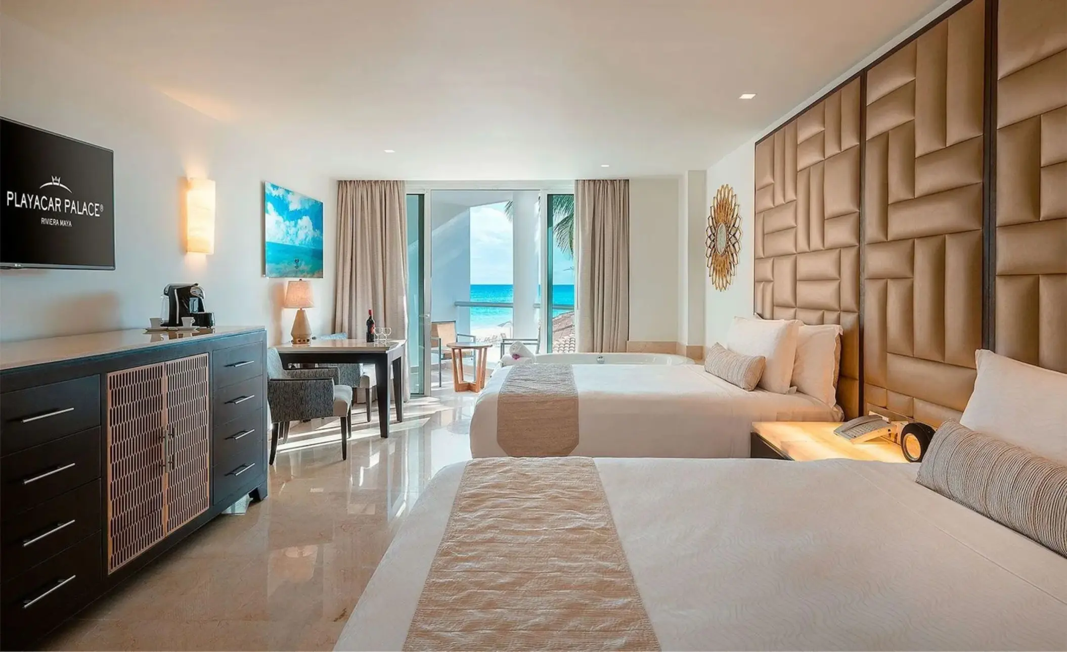 oceanview suite with two beds and hot tub at Playacar Palace