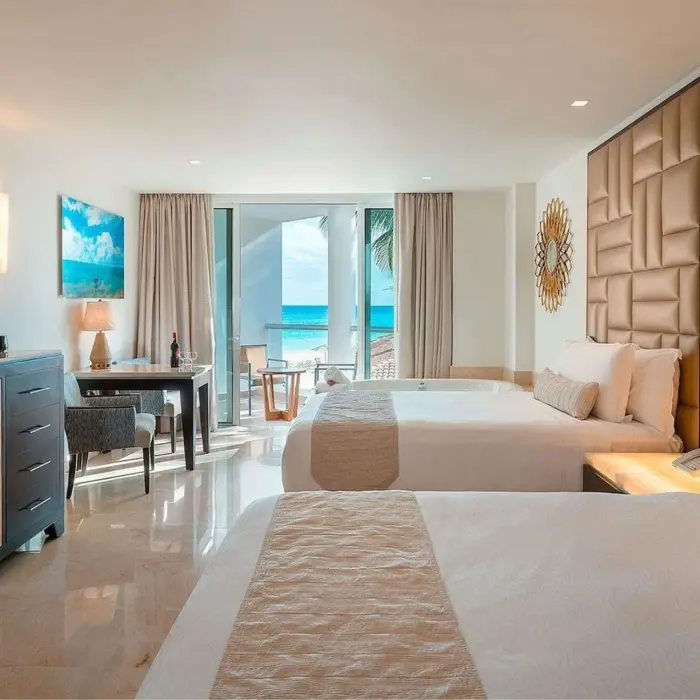 oceanview suite with two beds and hot tub at Playacar Palace