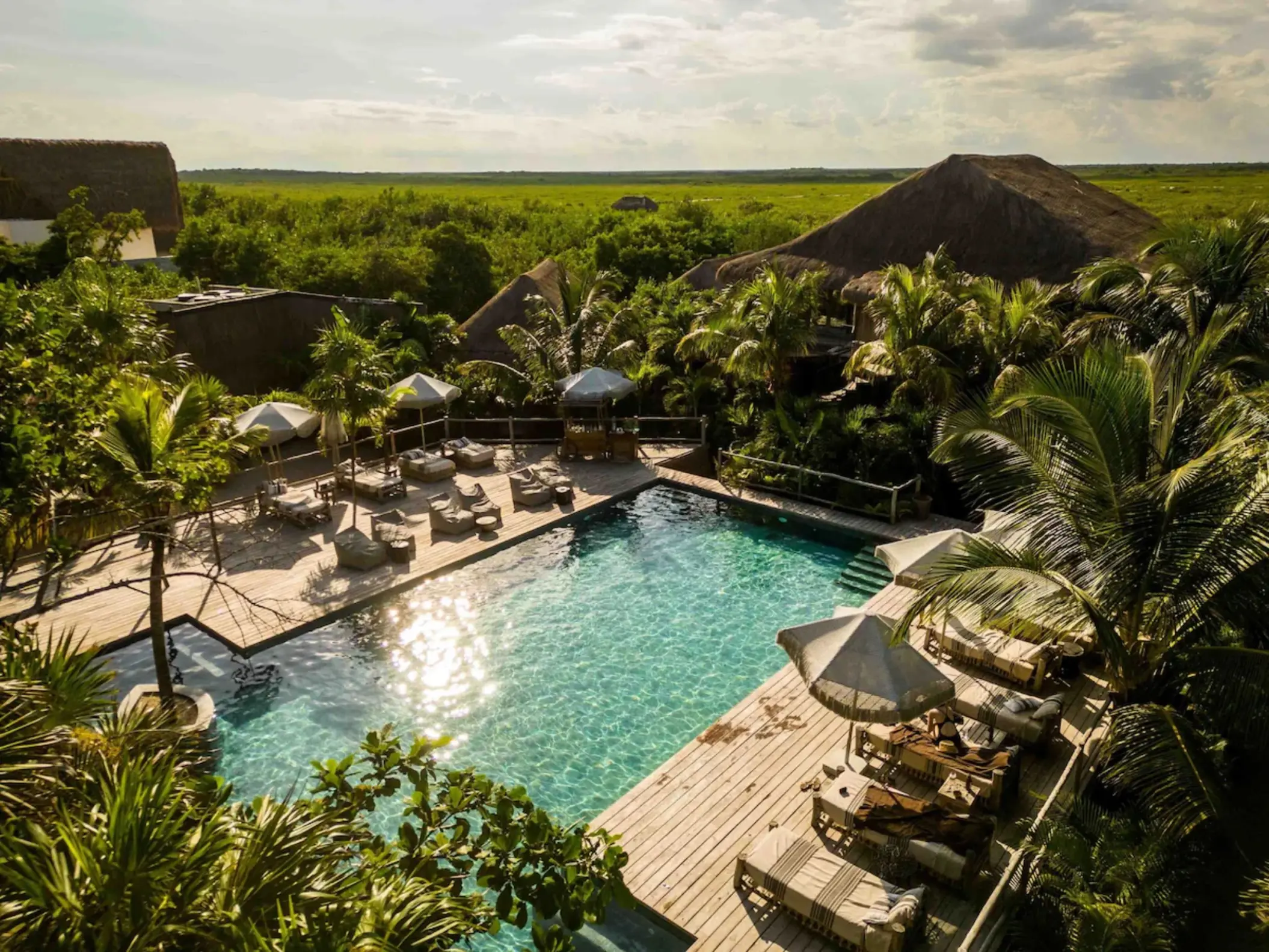 aerial view of the pool and accommodations at Radhoo Tulum