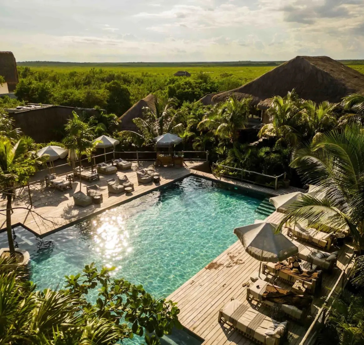 aerial view of the pool and accommodations at Radhoo Tulum