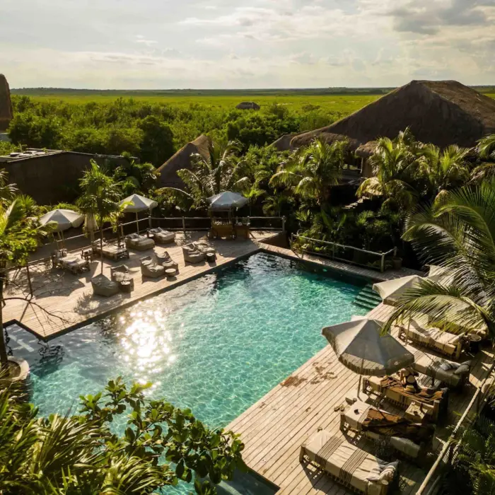 aerial view of the pool and accommodations at Radhoo Tulum