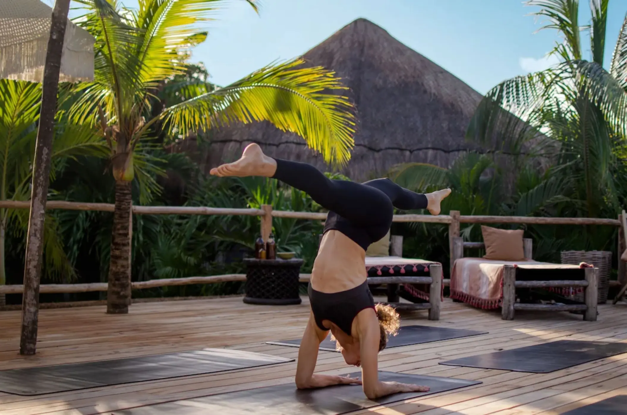 lady doing yoga at Radhoo Tulum