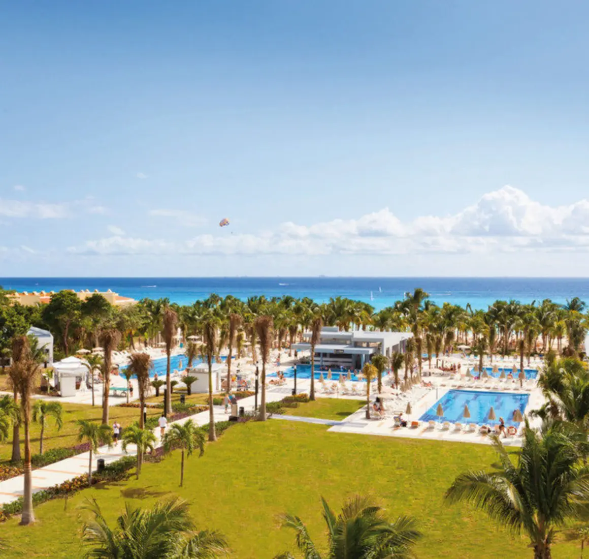aerial view of the pool and landscaped gardens and the beach at Hotel Riu Palace Mexico