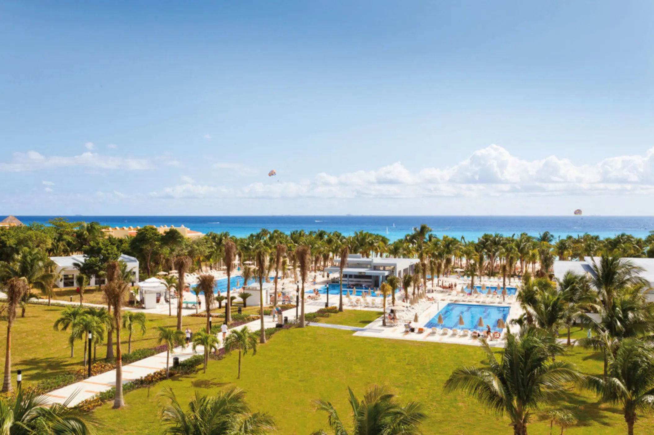 aerial view of the pool and landscaped gardens and the beach at Hotel Riu Palace Mexico