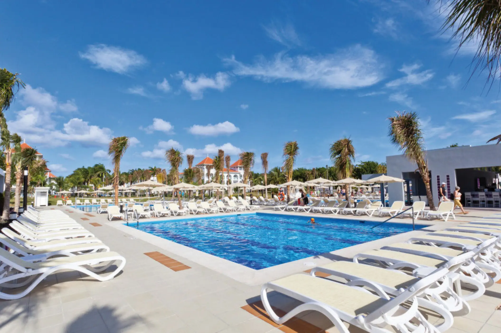 pool and loungers at Hotel Riu Palace Mexico
