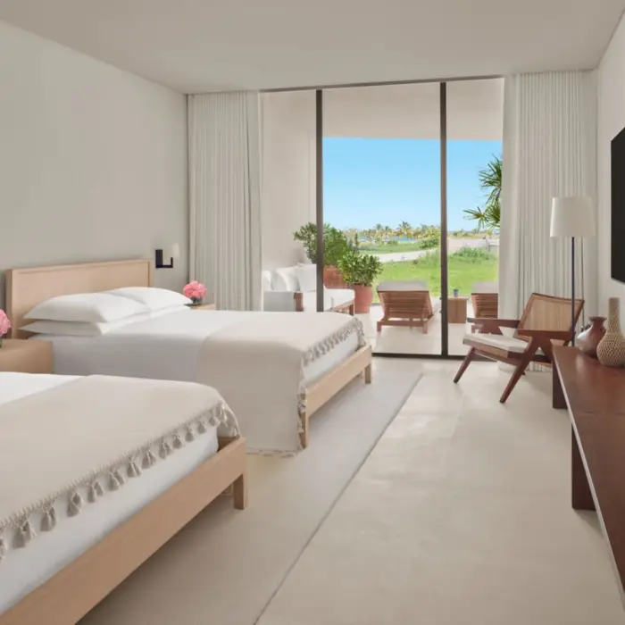 deluxe room with two queen beds at The Riviera Maya EDITION at Kanai