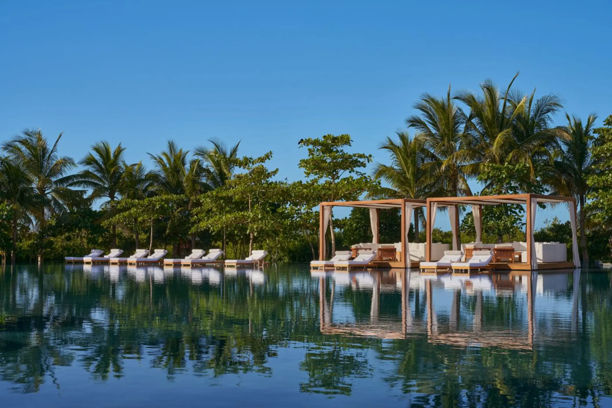 main pool and private cabanas at The Riviera Maya EDITION at Kanai