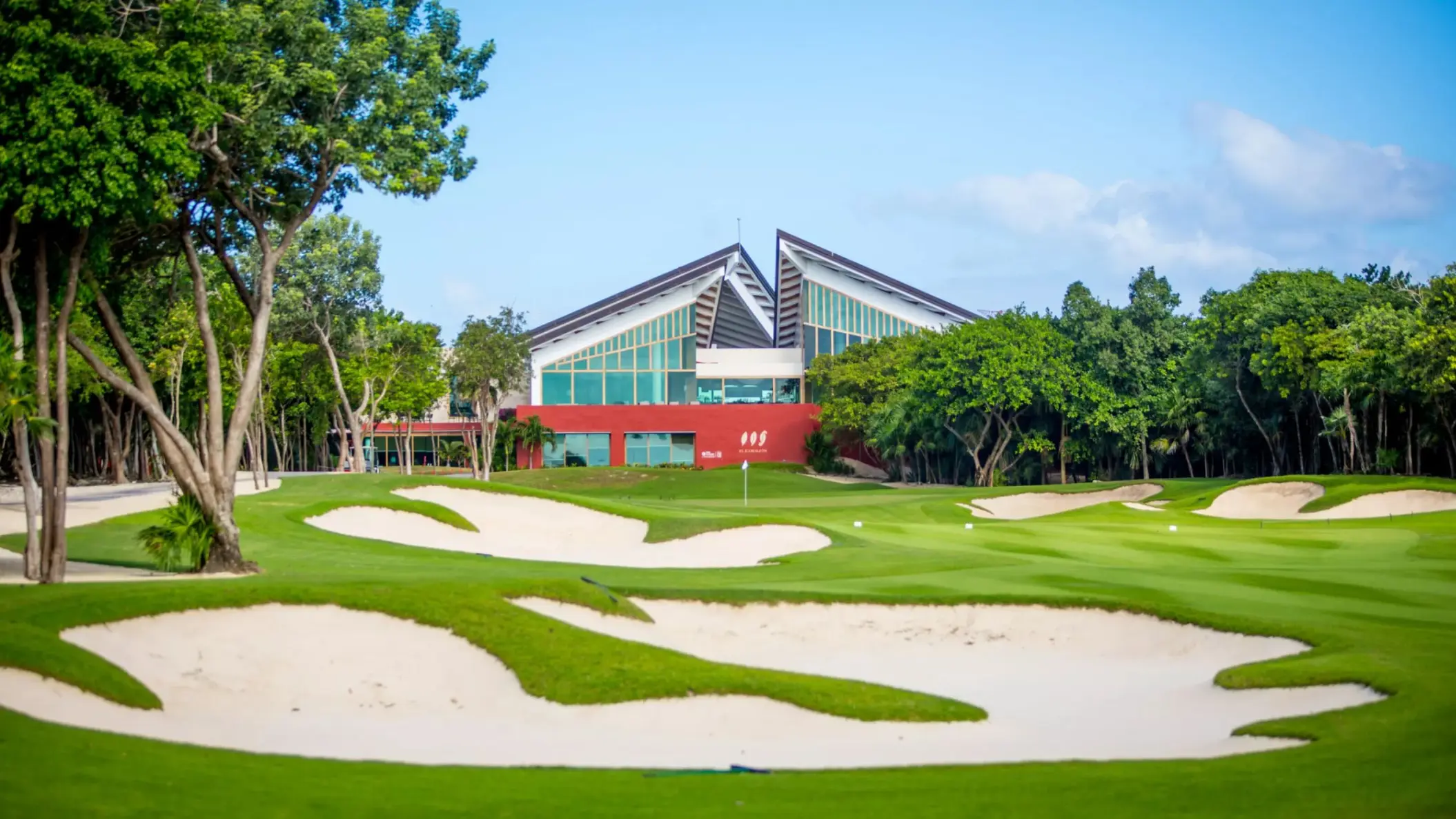 golf at El Camaleón course at Rosewood Mayakoba