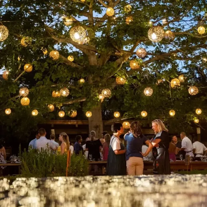 La Ceiba Garden and open-air kitchen dining space at Rosewood Mayakoba
