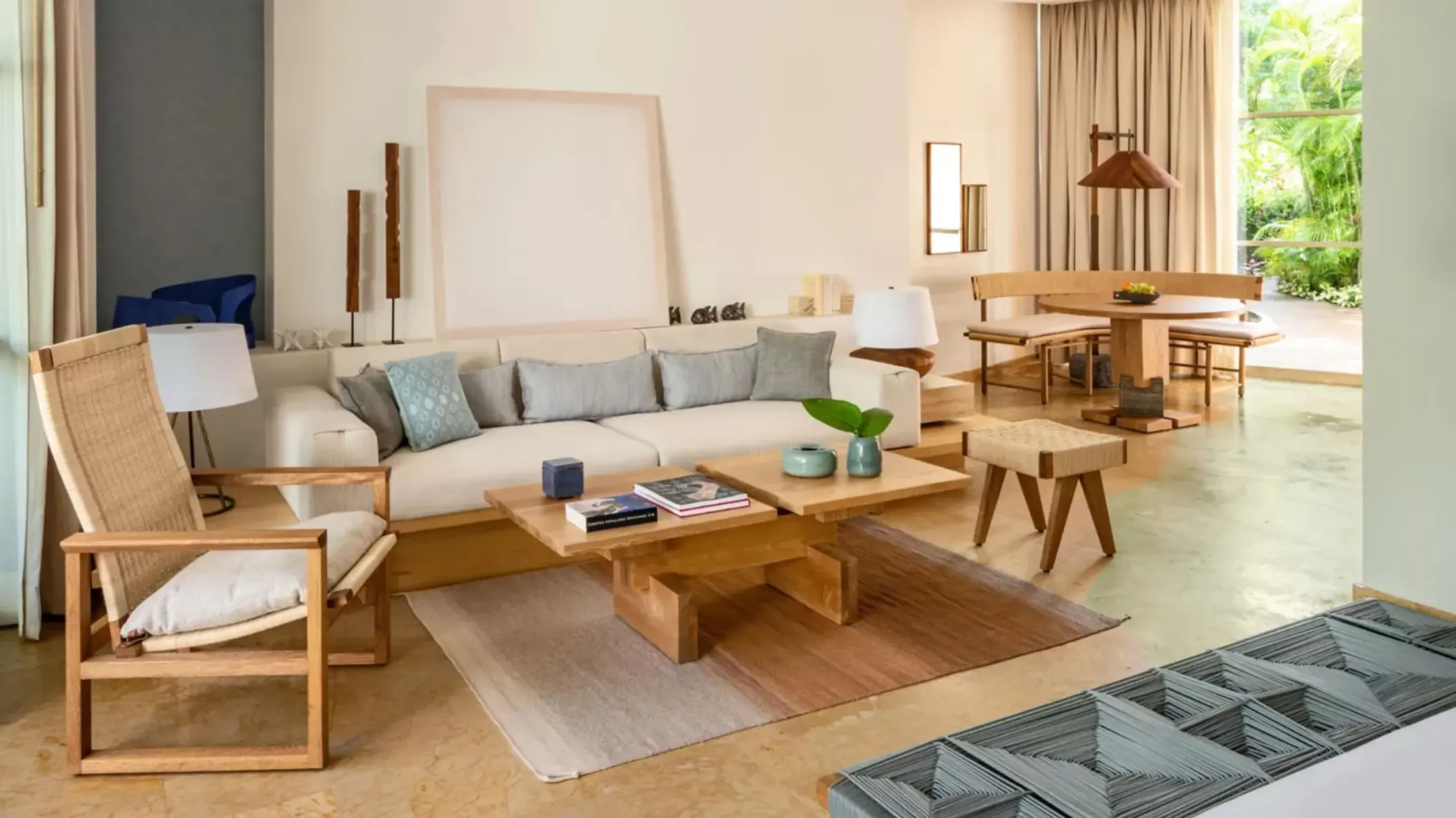 Spacious Lagoon Studio Suite King living room with modern decor at Rosewood Mayakoba
