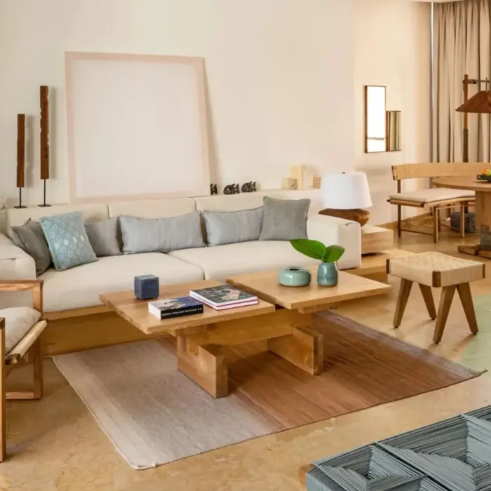 Spacious Lagoon Studio Suite King living room with modern decor at Rosewood Mayakoba