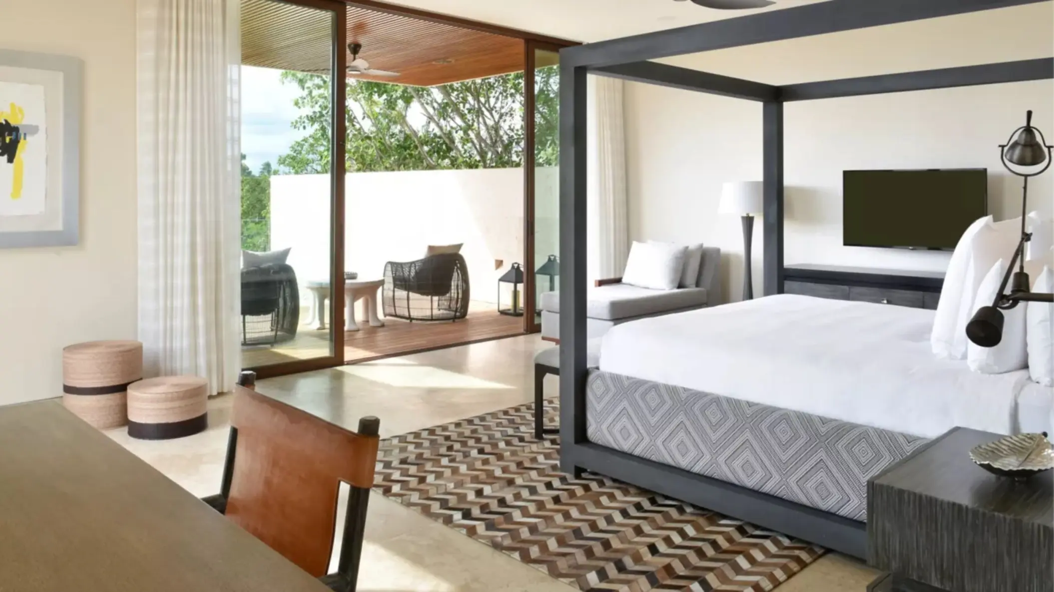 Manglar Three-Bedroom Villa at Rosewood Mayakoba with a private pool, lush greenery, and contemporary decor