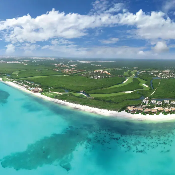 aerial view of the sea, the resort and the surrounding area of Rosewood Mayakoba