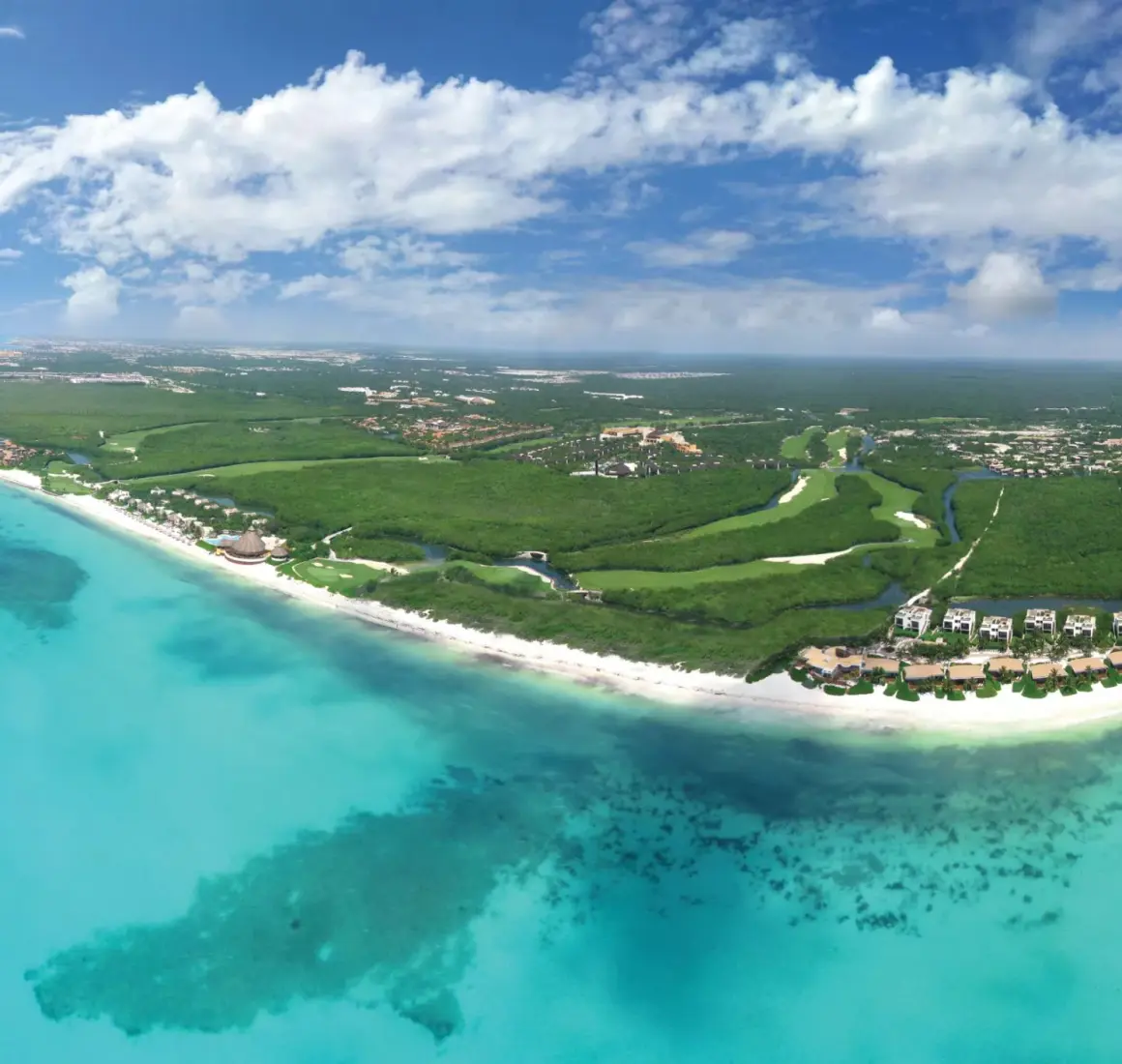 aerial view of the sea, the resort and the surrounding area of Rosewood Mayakoba