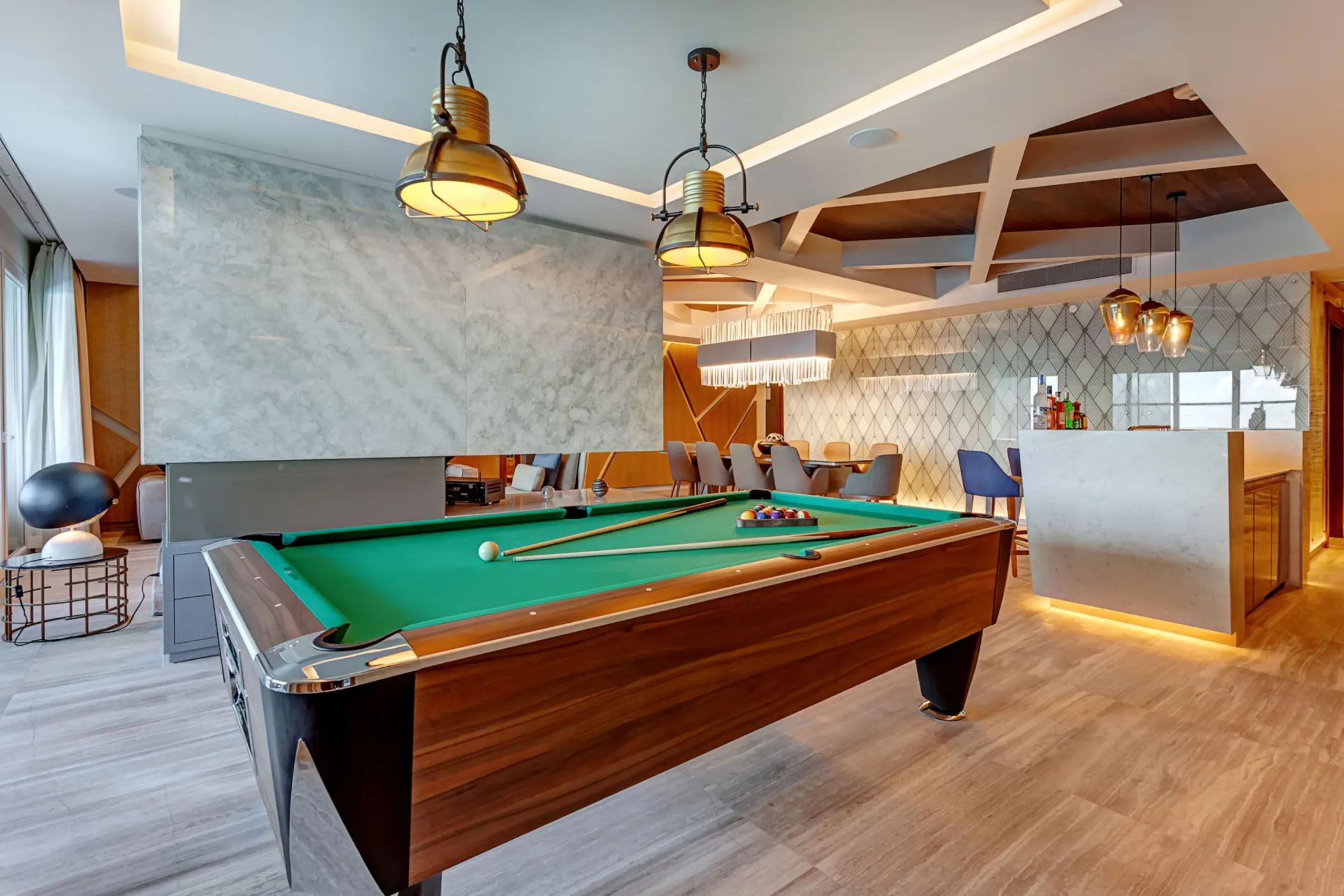 pool table and bar inside the chairman suite at Royalton CHIC Cancun