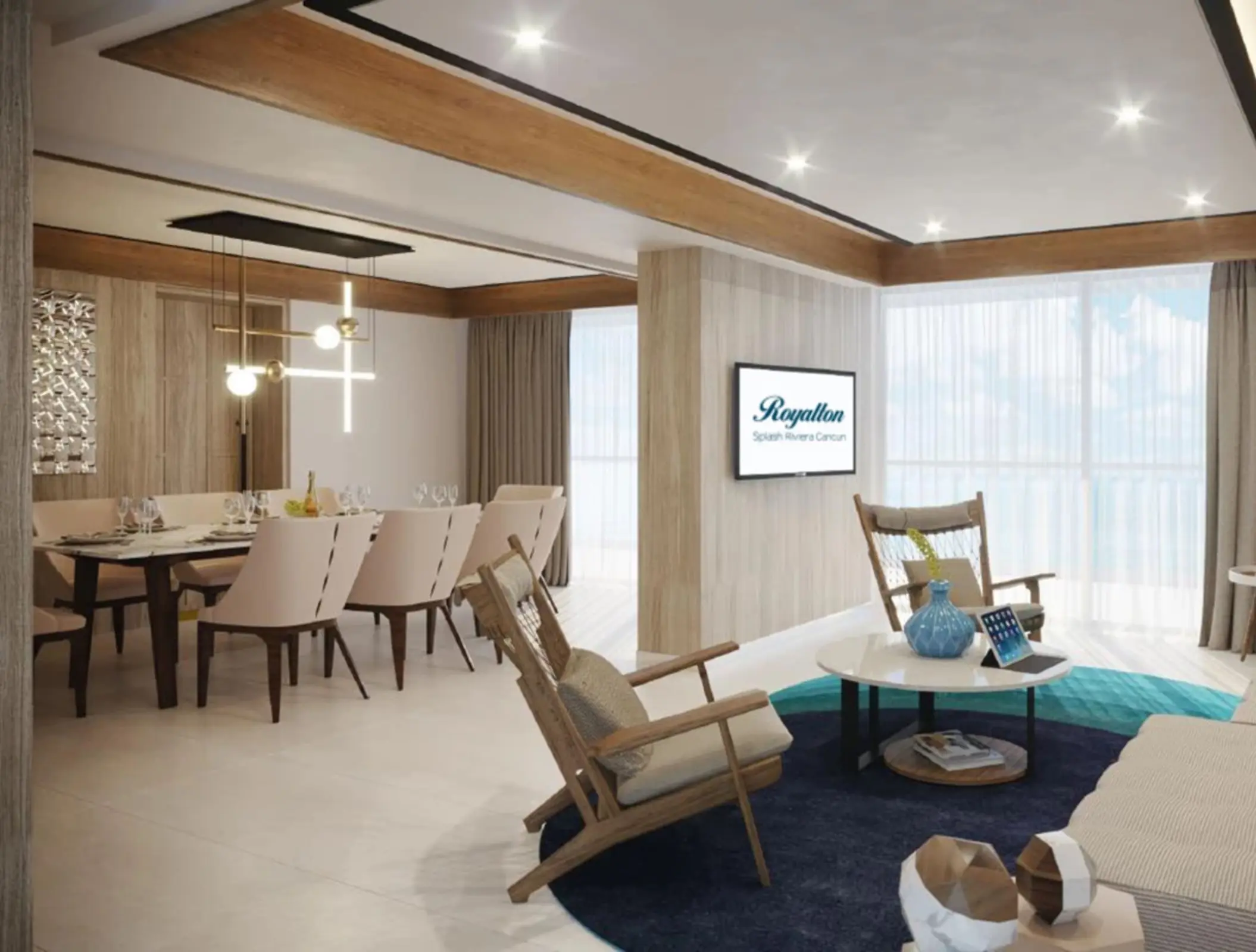 Spacious modern suite with dining area, living room, and large windows bringing in natural light.