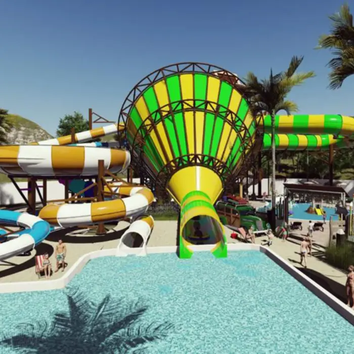 Outdoor waterpark with spiral slides and a funnel slide surrounded by palm trees and guests enjoying the pool.