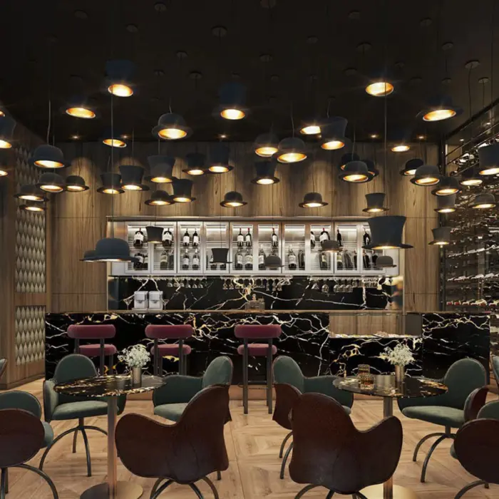 Elegant bar with velvet seating, hat-shaped pendant lights, and marble accents in a sophisticated nighttime setting.