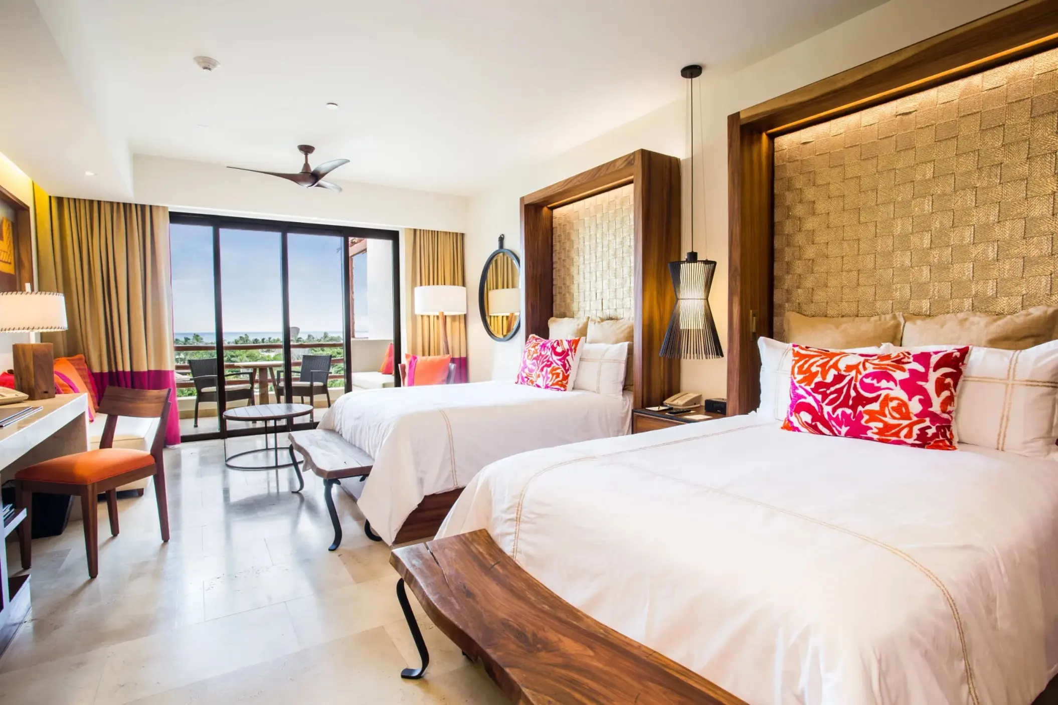 junior suite ocean view with double beds at Secrets Akumal Riviera Maya