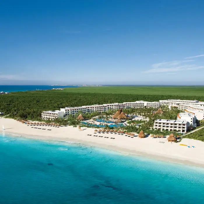 aerial view of Secrets Maroma Beach Riviera Cancun and its beach