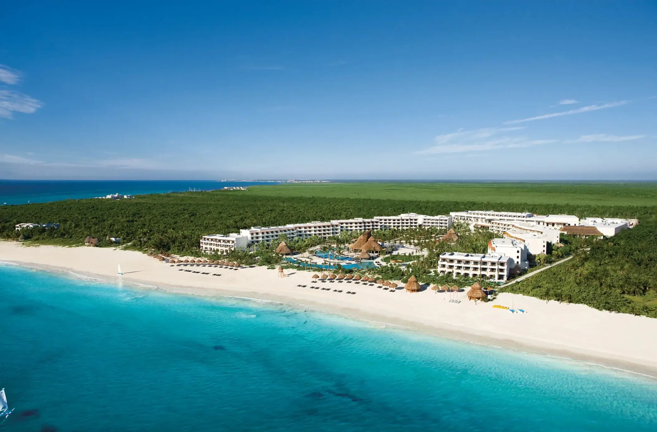 aerial view of Secrets Maroma Beach Riviera Cancun and its beach