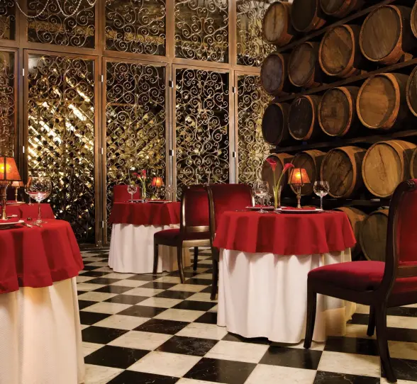 french restaurant bordeaux with wine barrels at Secrets Maroma Beach Riviera Cancun