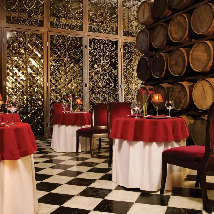 french restaurant bordeaux with wine barrels at Secrets Maroma Beach Riviera Cancun
