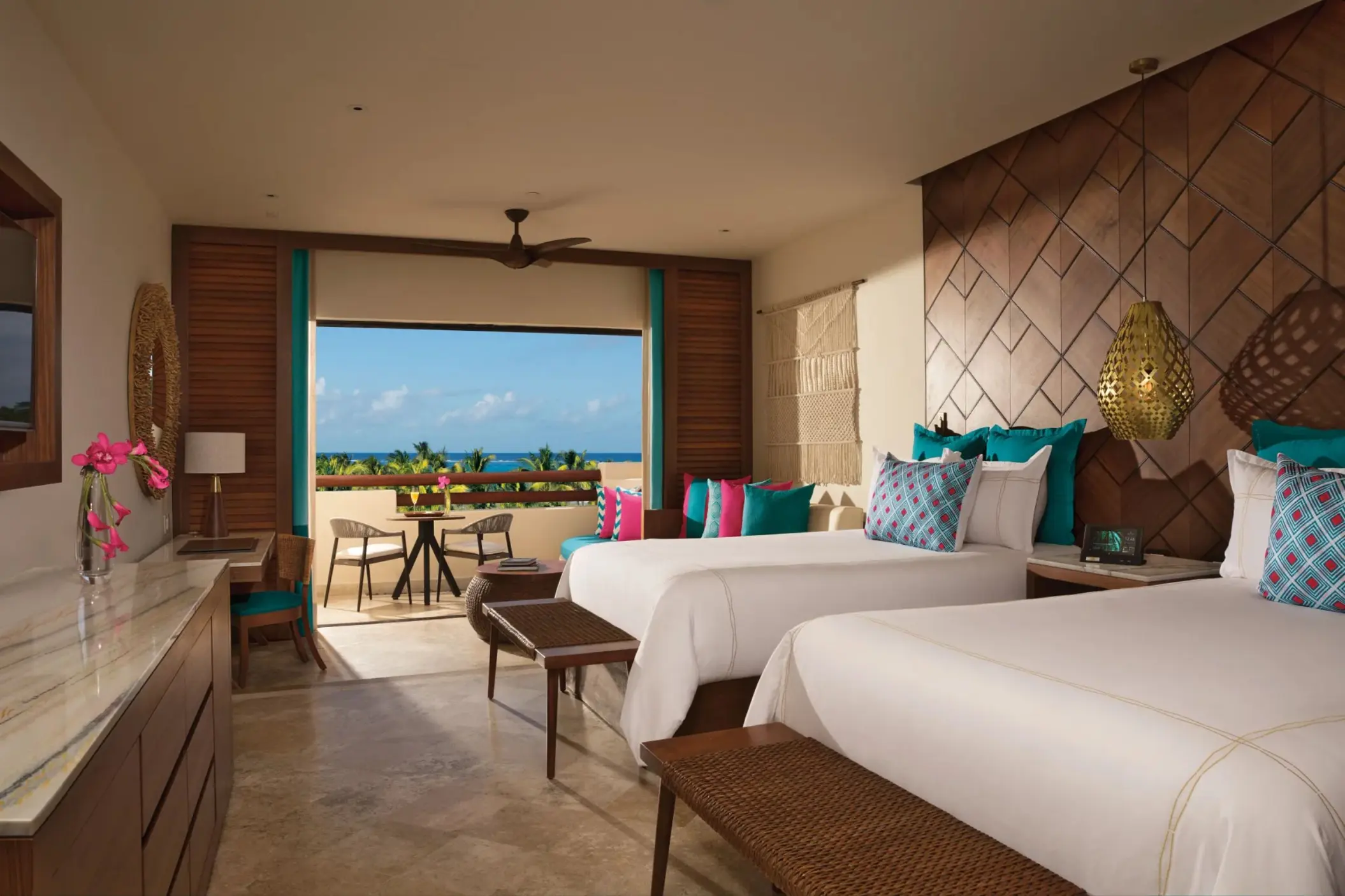 junior suite partial ocean view with two beds at Secrets Maroma Beach Riviera Cancun