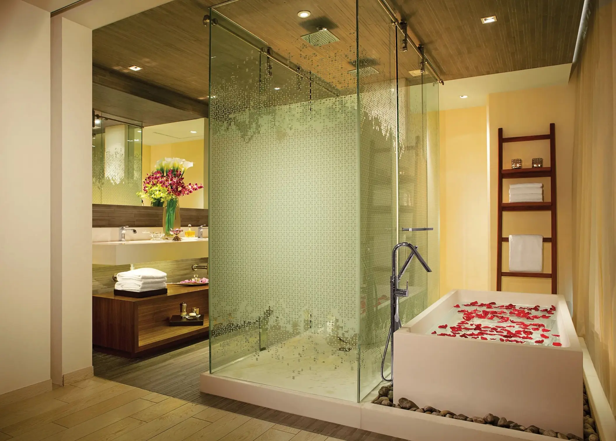 bathroom of the master suite with tub at Secrets The Vine Cancun