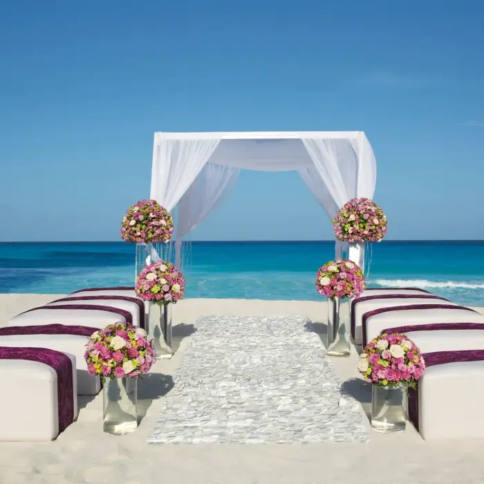 beach wedding ceremony setup at Secrets The Vine Cancun