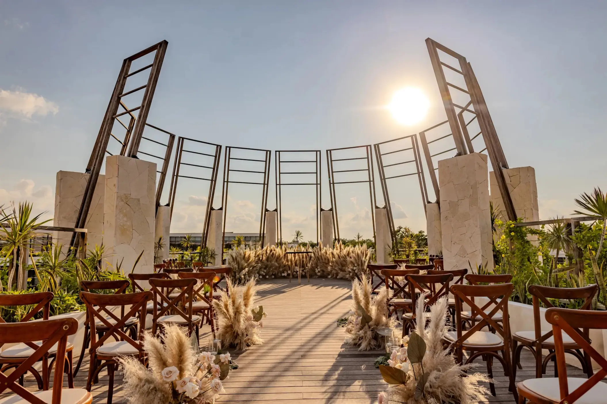 Sky Gazebo wedding venue with panoramic ocean views, draped canopy, and chic wooden deck setup.