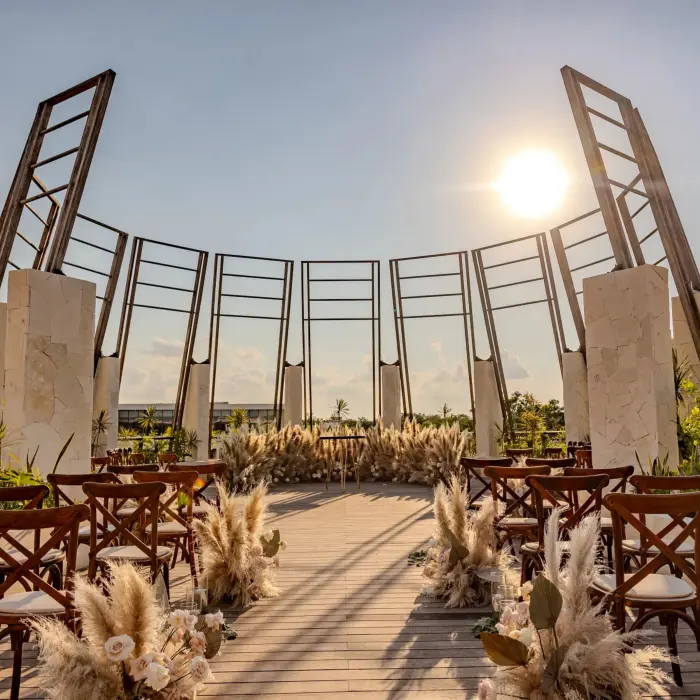 Sky Gazebo wedding venue with panoramic ocean views, draped canopy, and chic wooden deck setup.