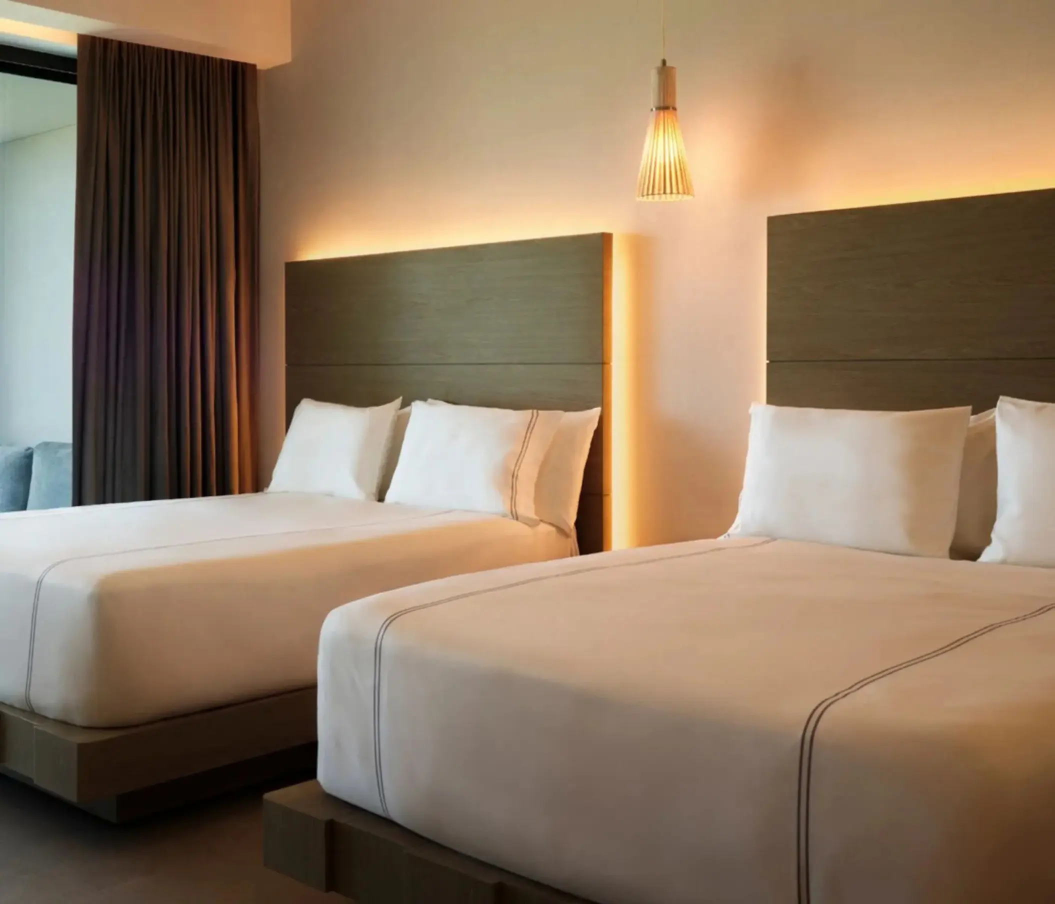 suite with two queen beds at SLS Playa Mujeres