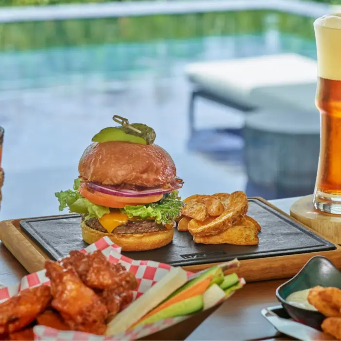 burger and sides and drinks at St. Regis Kanai Resort Riviera Maya