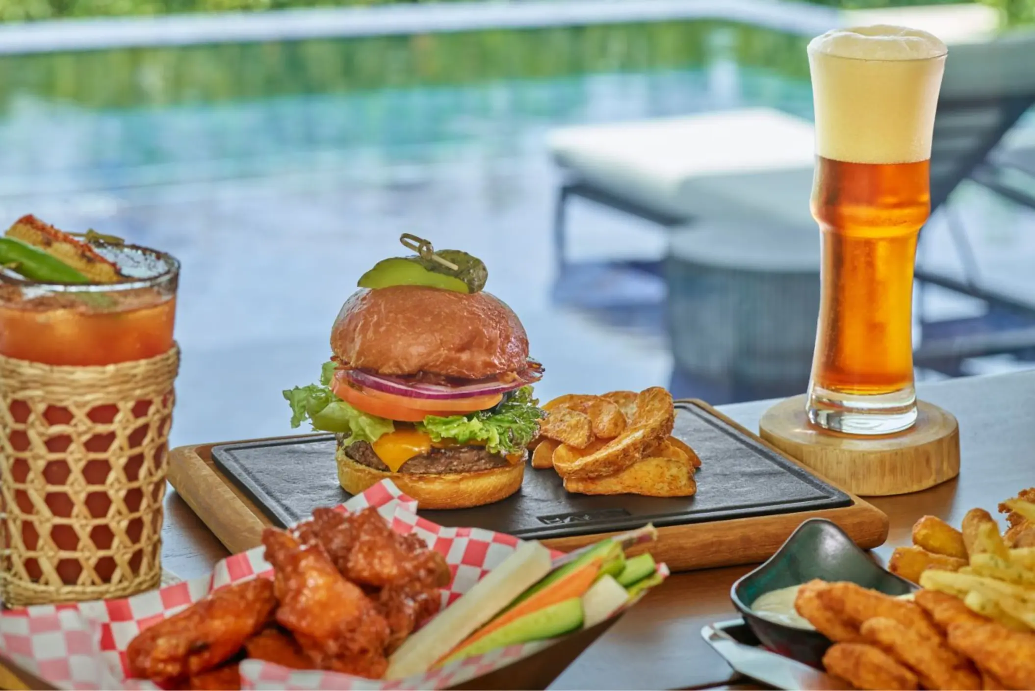 burger and sides and drinks at St. Regis Kanai Resort Riviera Maya