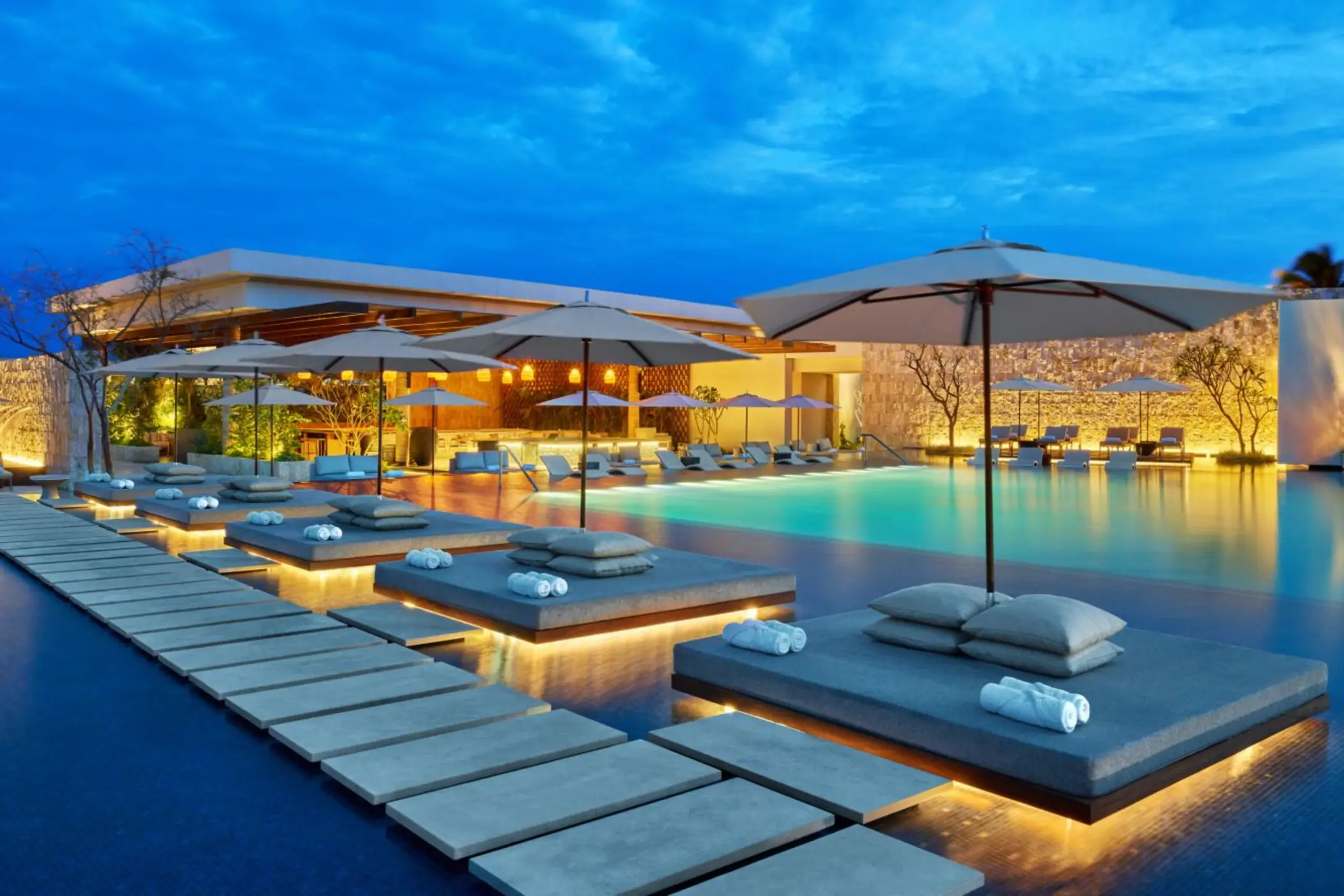 family pool and riviera restaurant at St. Regis Kanai Resort Riviera Maya