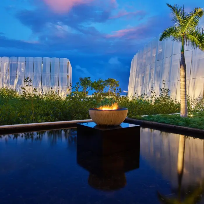 firepit and water mirror at the lobby at St. Regis Kanai Resort Riviera Maya