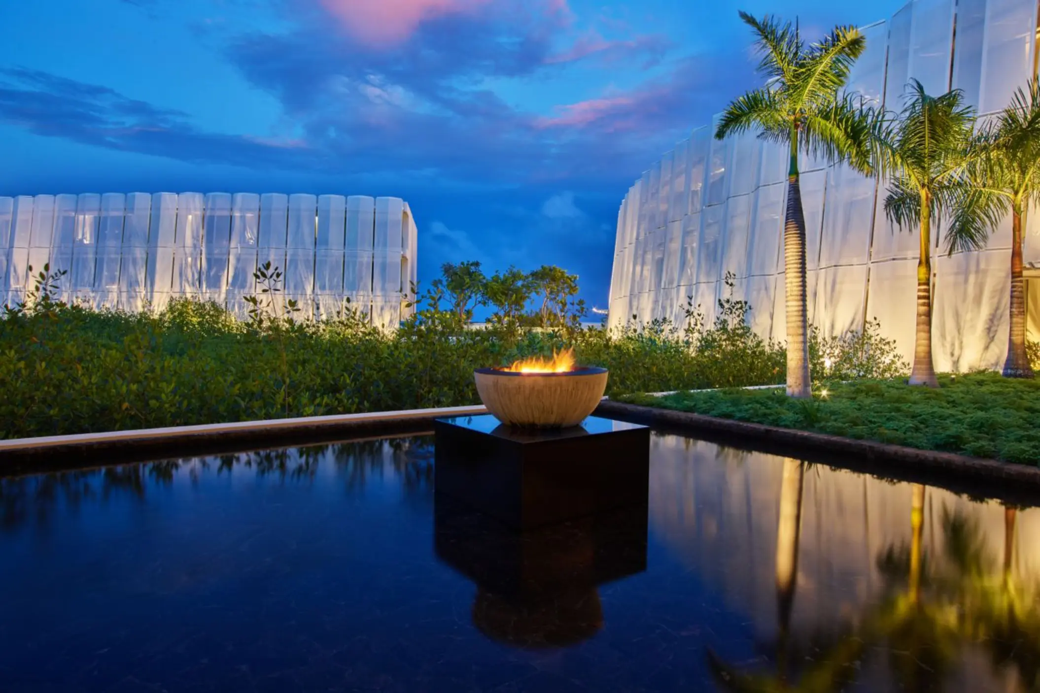 firepit and water mirror at the lobby at St. Regis Kanai Resort Riviera Maya
