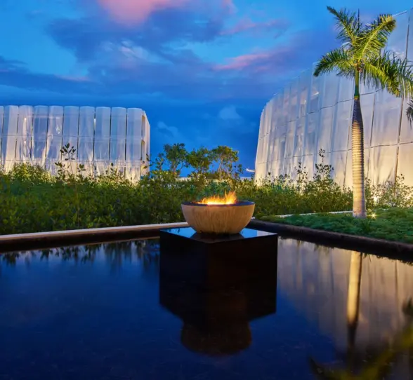 firepit and water mirror at the lobby at St. Regis Kanai Resort Riviera Maya