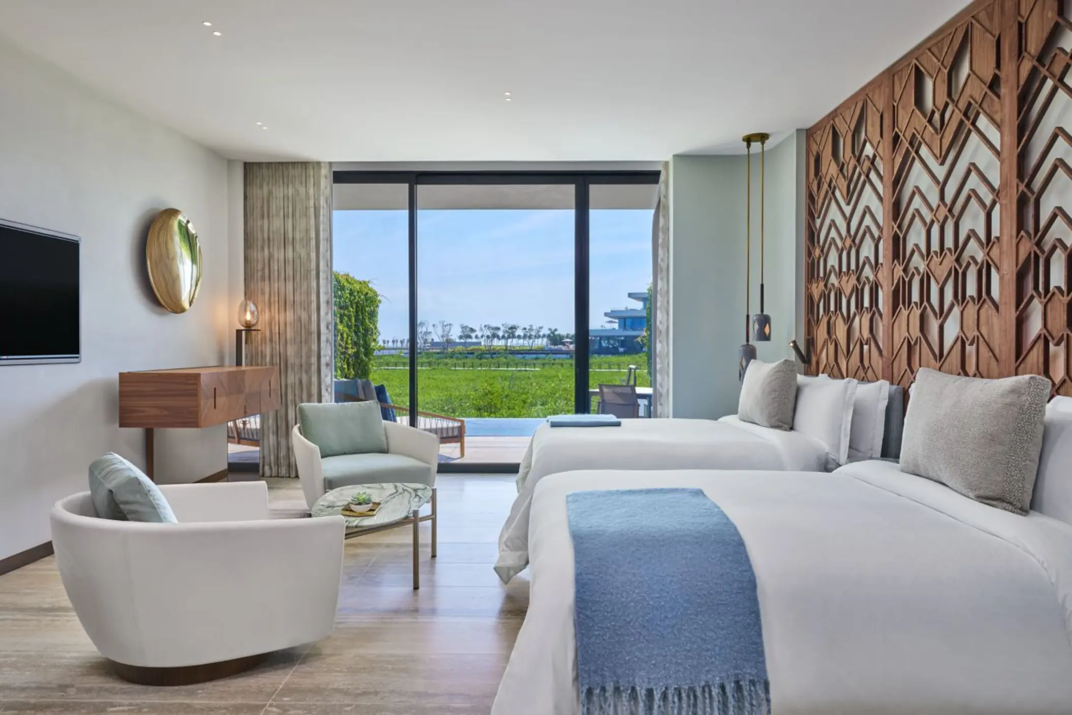grand luxe guest room with two queen beds ocean view at St. Regis Kanai Resort Riviera Maya