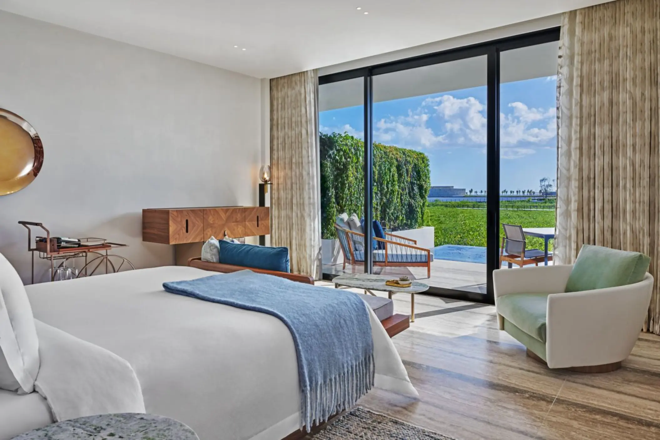 grand luxe king bed room with ocean view at St. Regis Kanai Resort Riviera Maya