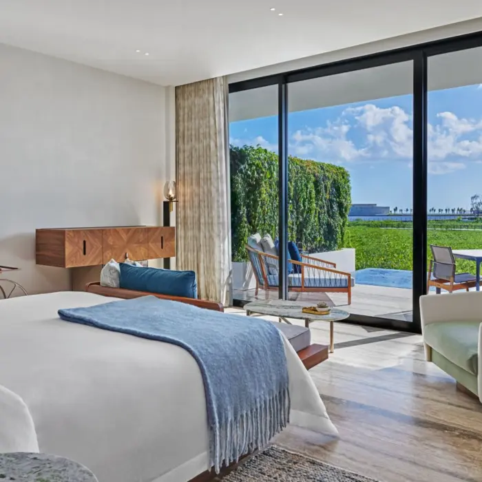 grand luxe king bed room with ocean view at St. Regis Kanai Resort Riviera Maya