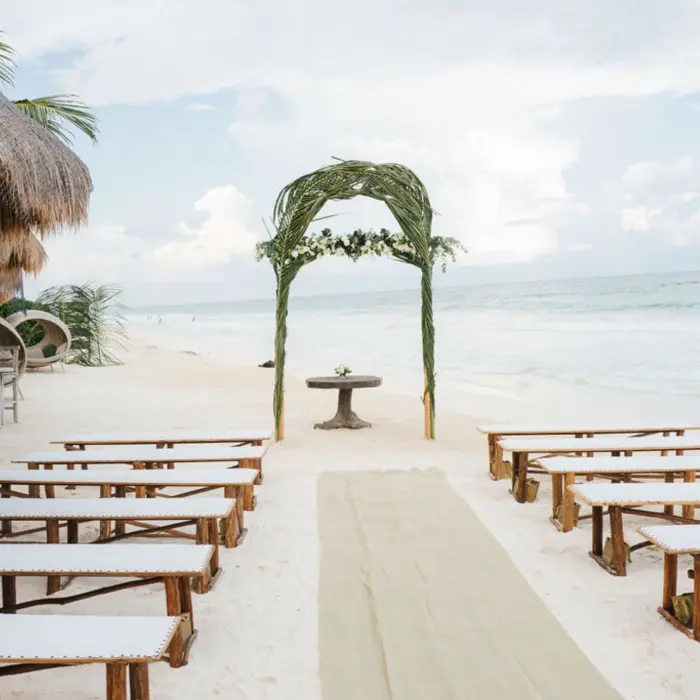 beach wedding setup at suenos tulum