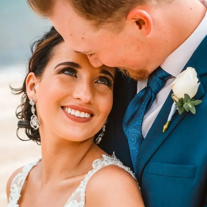 bride and groom on the beach at Sun Palace Cancun