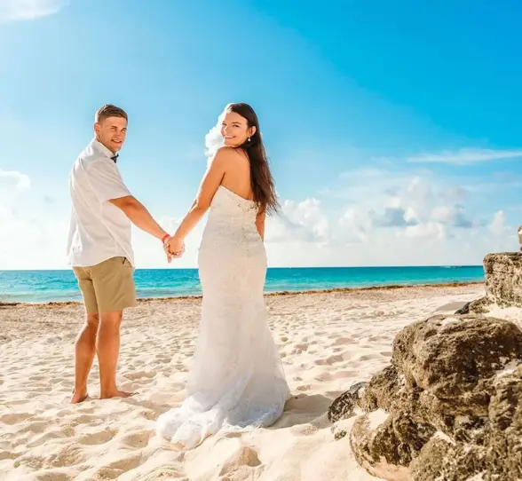 bride and groom on the beach at Sun Palace Cancun