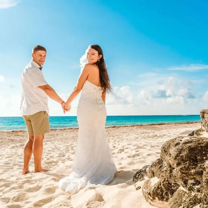 bride and groom on the beach at Sun Palace Cancun