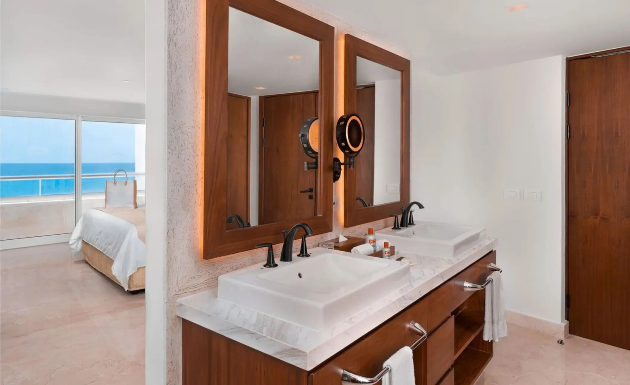 washroom with 2 sinks at Sun Palace Cancun