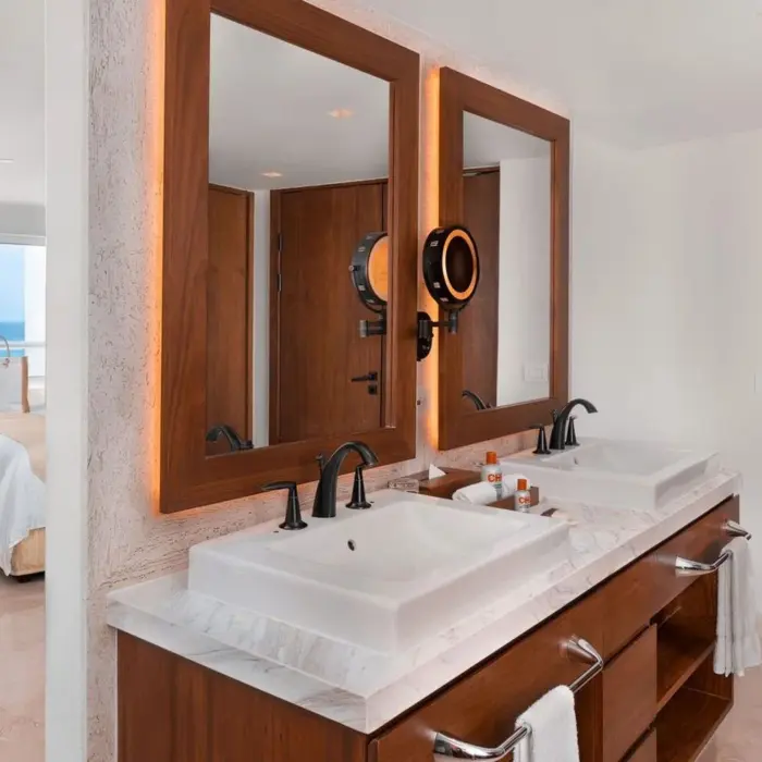 washroom with 2 sinks at Sun Palace Cancun