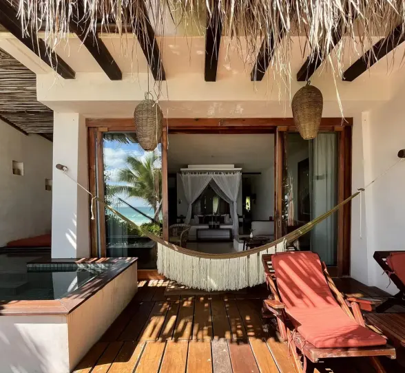 junior suite terrace with loungers and plunge pool at The Beach Tulum Hotel