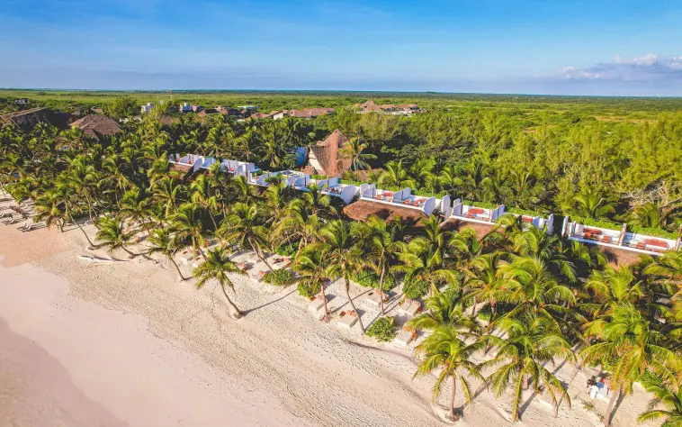 aerial view of the The Beach Tulum Hotel with its rooftop suites and beach